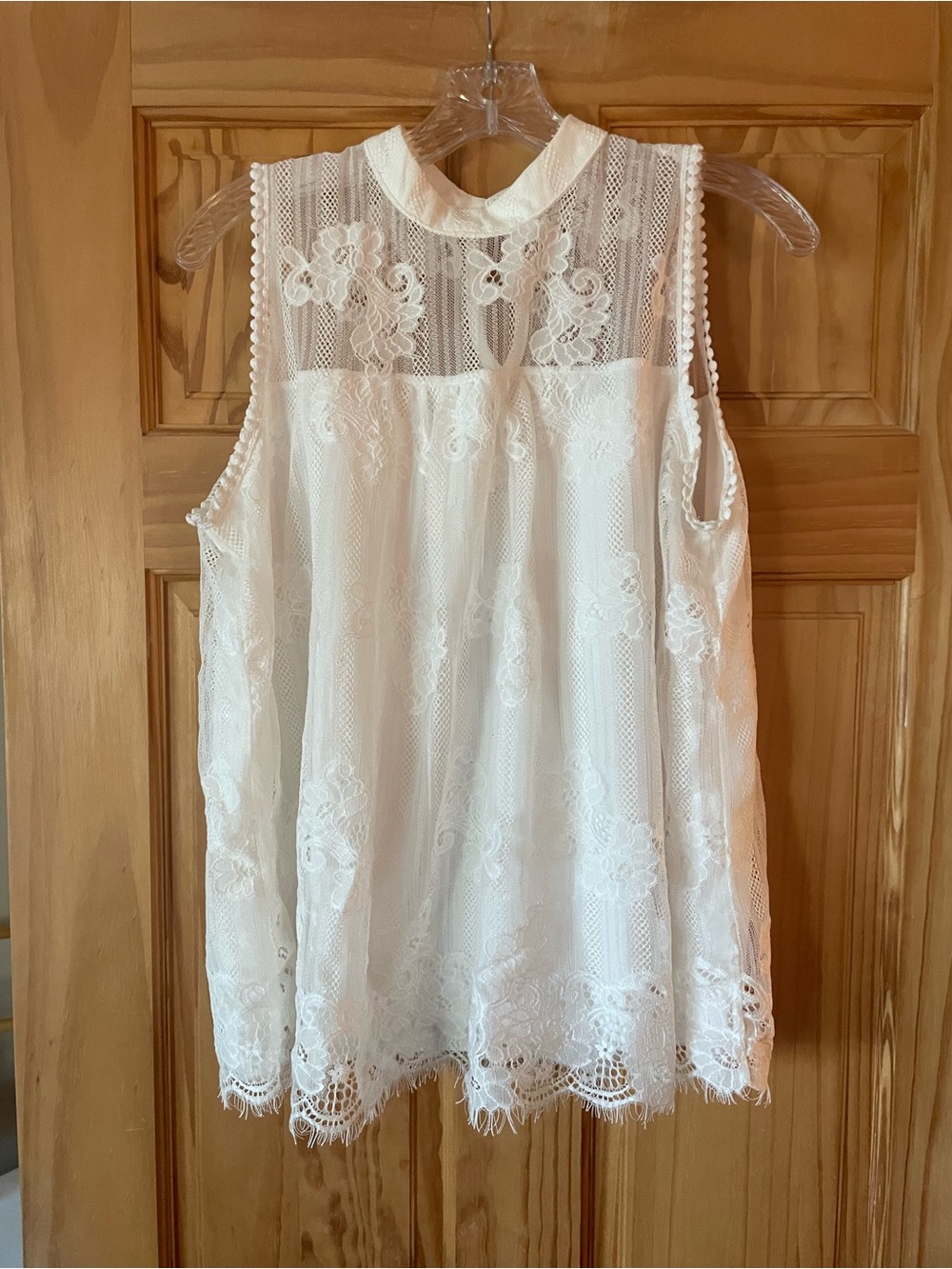 Sleeveless White Lace High-Neck Blouse